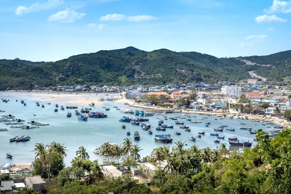 a_stunning_aerial_view_of_a_bustling_coastal_fishing_village_with_boat.webp