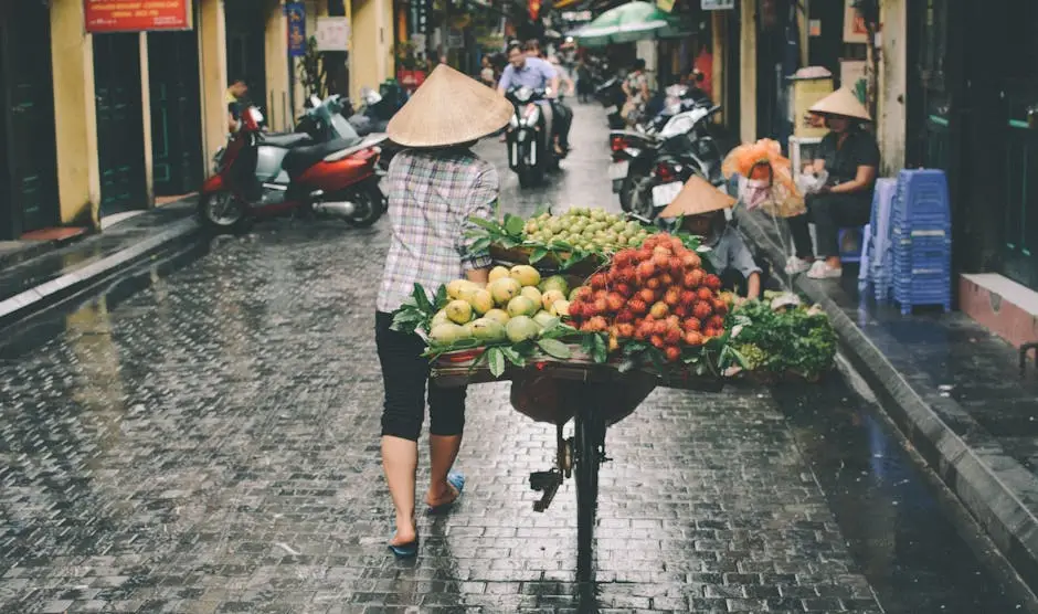 a_woman_sells_fresh_fruits_in_a_ng_a_street_market_hanoi_vietnam.webp
