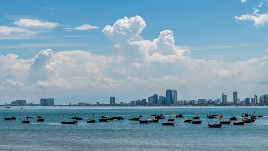 beautiful_view_of_da_nang_cityscape_with_boats_in_the_foreground_on_a_.webp