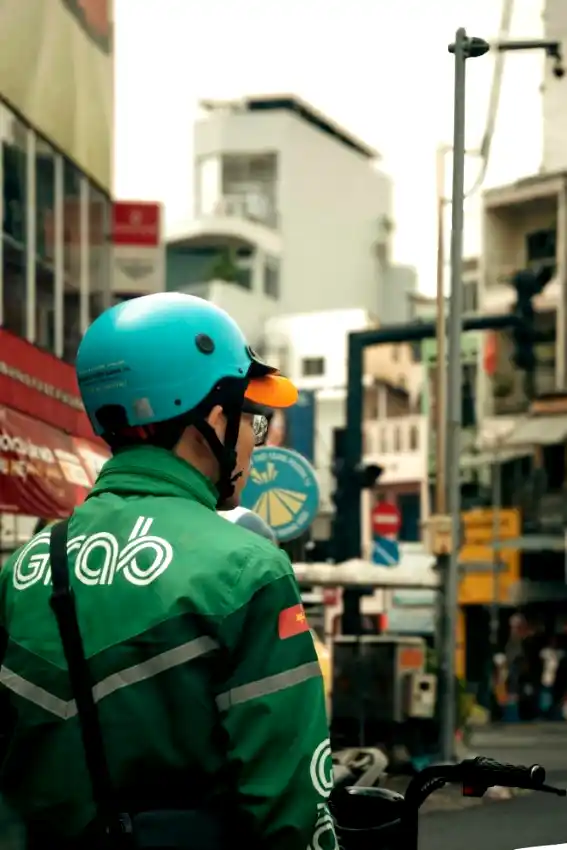 grab delivery driver motorbike saigon