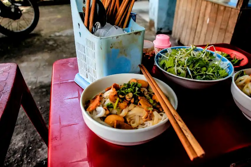 traditional quang style noodles red table